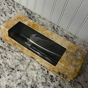 Feather Pen and Ink bottle